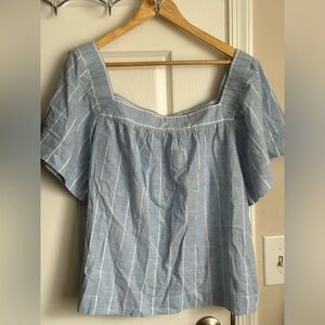 Light blue blouse. Brand new with tags